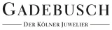 Logo of the jeweler Gadebusch: Black lettering on a white background, with GADEBUSCH set in a large, elegant serif typeface. Below, in smaller text, appears DER KÖLNER JUWELIER, framed by two horizontal lines on the left and right.
